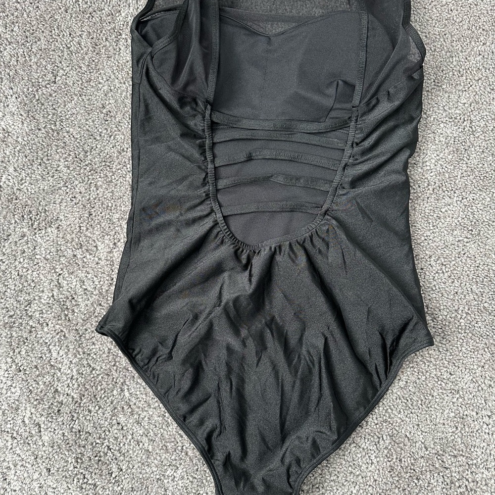 Like new, Albion Fit Maria swim. Size large.